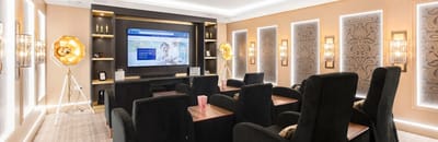 Interior view of a common area with seating and lighting