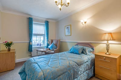 Well-furnished resident room with a cozy atmosphere