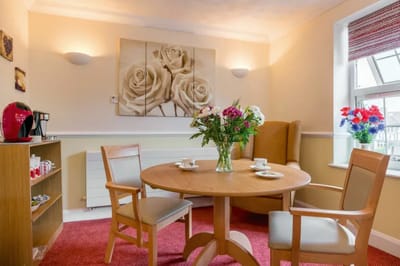 Cozy common area with flowers and seating