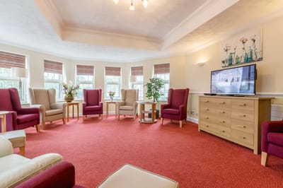 Bright common area with seating and plants