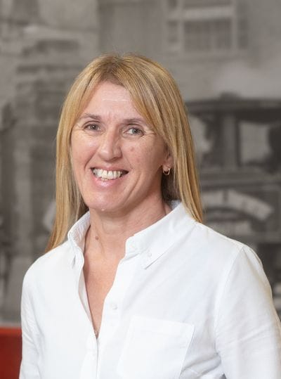 Portrait of a staff member smiling