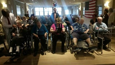 Residents participating in an activity in the common area