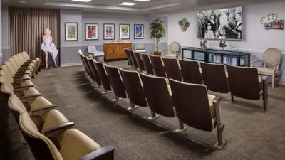 Interior activity room with seating and artwork