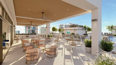 An outdoor dining area with seating and plants