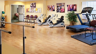 Interior view of an exercise area with fitness equipment