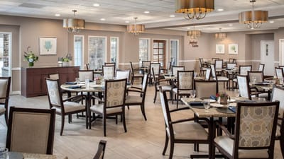 Dining room with neatly arranged tables and chairs