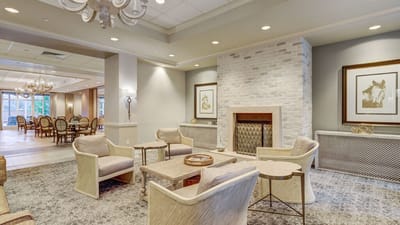 Welcoming lobby area with seating and dining space