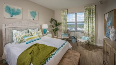 Brightly decorated resident room with floral accents