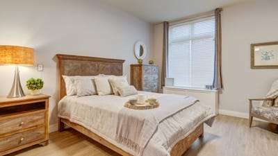 Cozy private bedroom with a bed and decorative elements