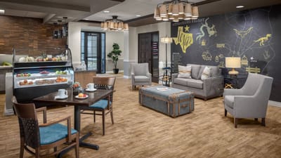 Bright dining area with food displays and seating
