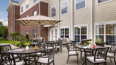 Outdoor patio area with seating and tables