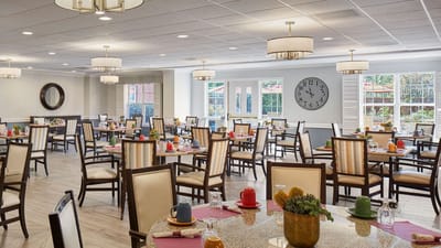 Dining room with tables set for meals