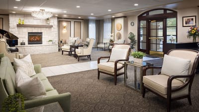 Welcoming lobby area with seating and fireplace