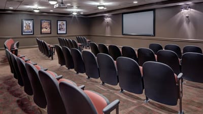 Interior view of a theater-style room with seating