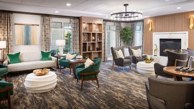 Bright common area with comfortable seating and decor