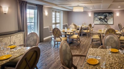Dining room with tables set for a meal