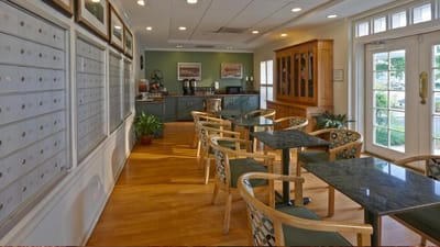 Bright common area with tables and chairs