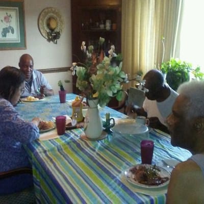 Residents enjoying a meal in the dining area