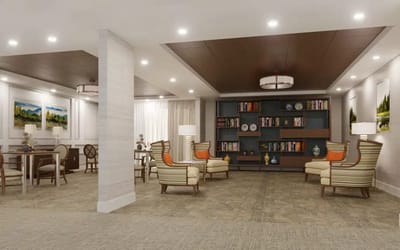 Common area with seating and bookshelves