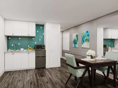 Bright, modern kitchen area with dining table