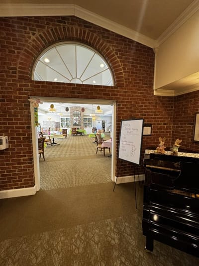 Interior view of a common area with seating and activities
