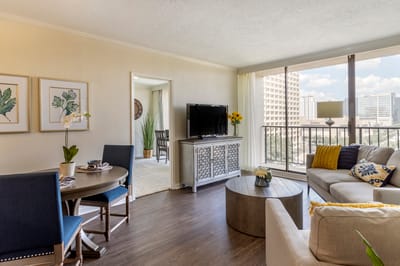 A cozy and inviting living room in a senior living facility
