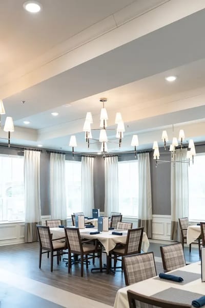 Bright dining room with modern decor and tables
