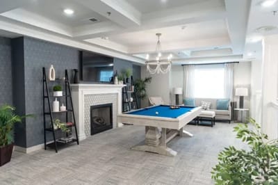 Common area with a pool table and seating