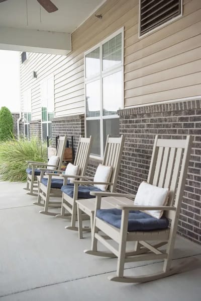 Outdoor seating area with rocking chairs