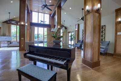 Interior view of a welcoming lobby with a piano