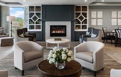Comfortable common area with seating and fireplace