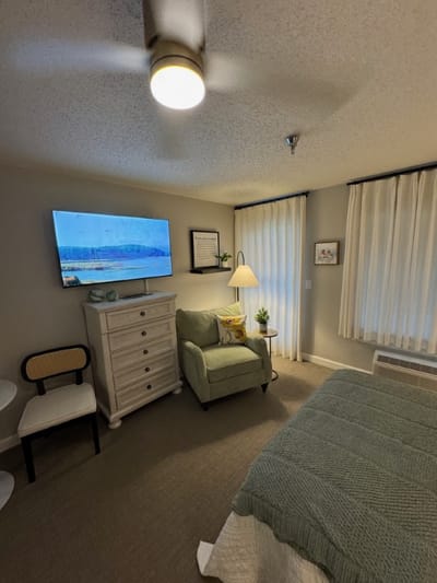 Private resident room with a cozy seating area