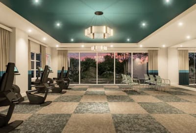 Interior view of a fitness room with exercise equipment