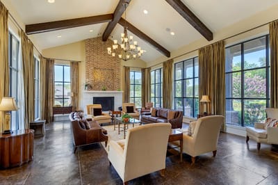 Bright and spacious common area with seating and natural light