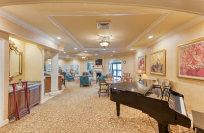 Interior view of a common area with a piano
