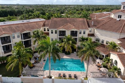 Aerial view of a pool and patio area at the facility