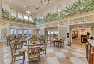Bright and inviting dining area with murals