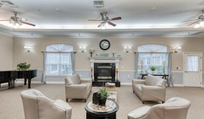 Interior common area with chairs and piano