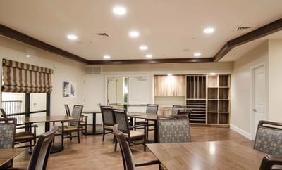 Bright dining area with tables and chairs