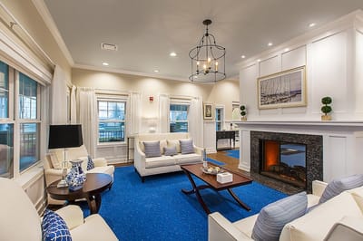 Bright common area with modern seating and decor