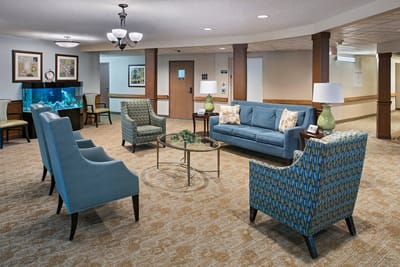 Bright common area with comfortable seating and decor