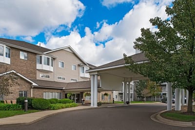 Front entrance of American House Southland with landscaped area