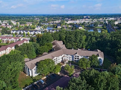 Aerial view of American House Westland Hunter surrounded by greenery