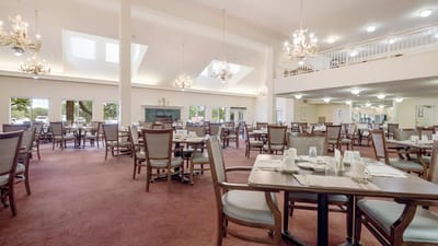 Interior view of a spacious dining room with tables