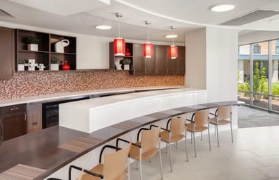 Bright and modern common area with seating and decor