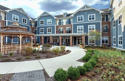 Exterior view of Azpira Place with landscaped courtyard