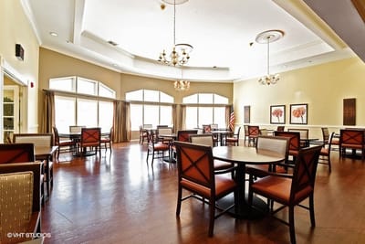 Bright dining room with tables and chairs