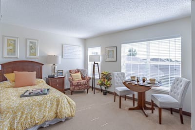Cozy interior of a resident room with seating area