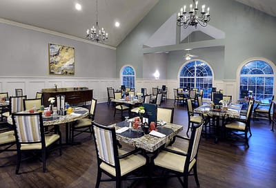Dining area with tables set for a meal