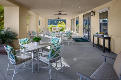 Outdoor patio area with seating and plants